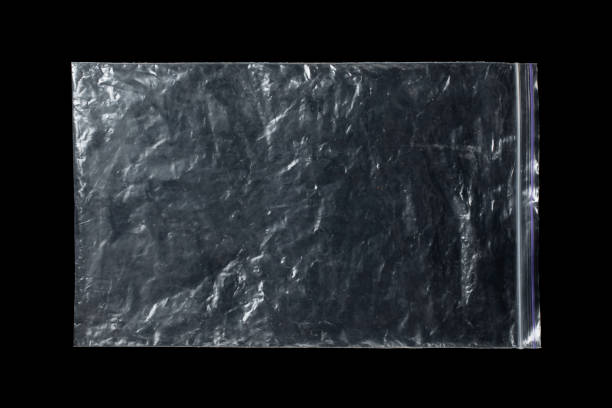 istock Transparent plastic bag isolated on black background. 1629895669