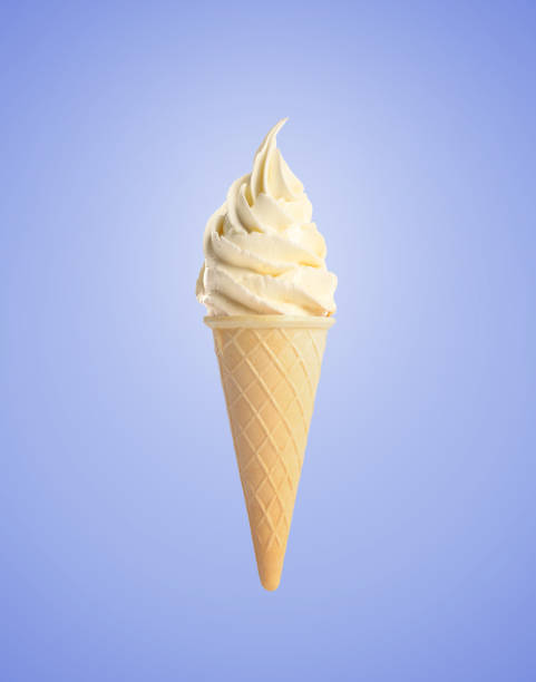 istock Tasty vanilla ice cream in waffle cone on pastel blue background. Soft serve 1629901667
