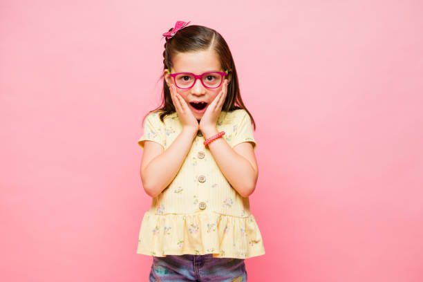 istock Elementary age little girl looking surprised screaming 1629925447