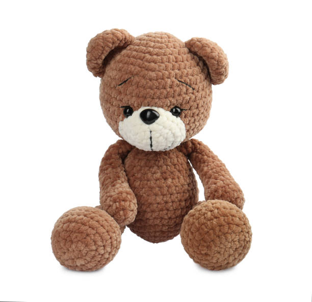 istock Cute crocheted bear isolated on white. Children's toy 1629988504