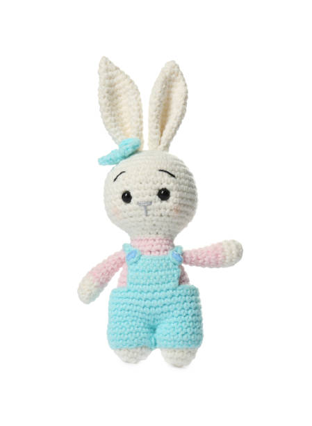 istock One crochet rabbit isolated on white. Children's toy 1629989087
