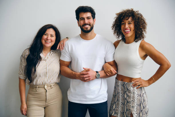 Adult Friends A diverse group of friends together. three-people stock pictures, royalty-free photos & images