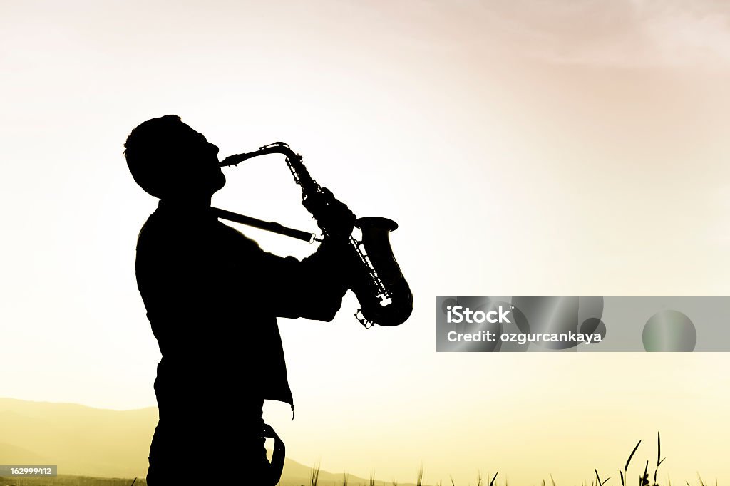 Saxophone Player saxophone Adult Stock Photo