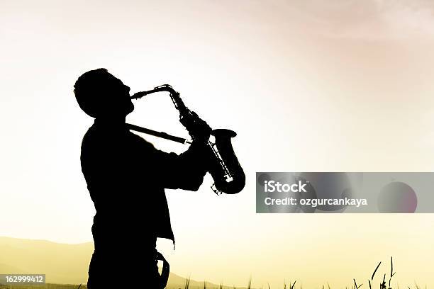 Saxophone Player Stock Photo - Download Image Now - Adult, Adults Only, Blowing