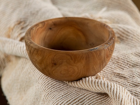 Wooden Bowl On Blank Canvass.
