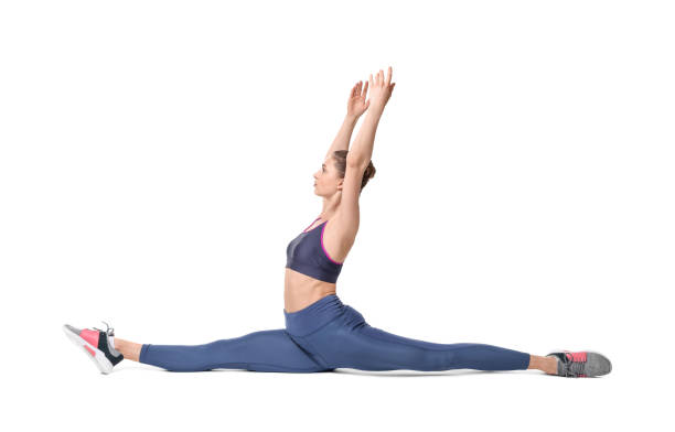 istock Yoga workout. Young woman stretching on white background 1630017848