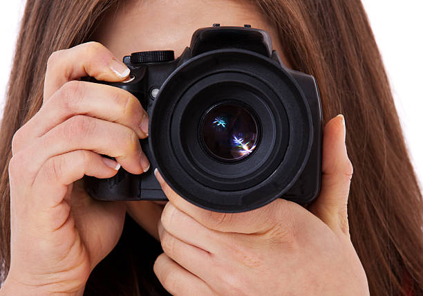 istock Teenage girl using camera 163002509