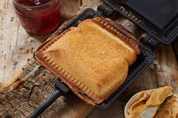 Campfire Peanut Butter and Strawberry Jam Sandwich with Kettle Potato Chips