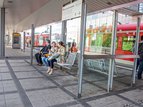 Frankfurt, Germany - May 17, 2014: people waiting for next s- Bahn - local Train - at station Gallus..