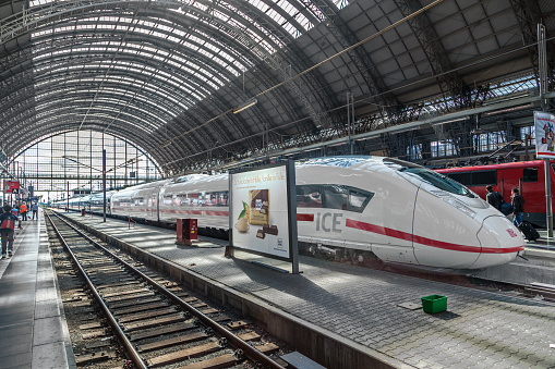 Frankfurt, Germany - May 16, 2014: Inside the Frankfurt central station in Frankfurt, Germany. People hurry to the intercity high speed train.
