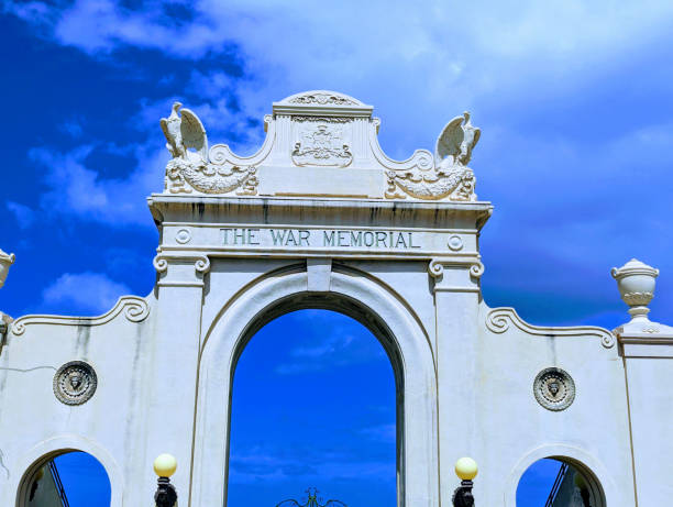 Waikiki -   June 25, 2023:  The Waikiki Natatorium War Memorial, a beautiful and solemn memorial located in Honolulu, Hawaii, USA. Built in the form of an ocean water public swimming pool, it was created as a living tribute to the men and women who served during World War I. The peaceful morning light highlights the memorial's intricate architecture and serves as a reminder of the sacrifices made by those who fought for our country.
