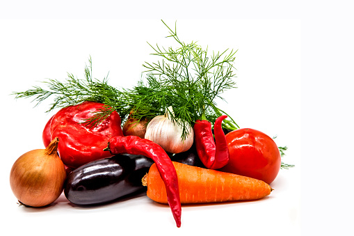 Fresh vegetables isolated on white background.