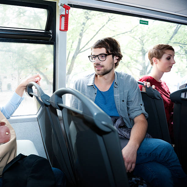 istock Jealous woman with boyfriend in public bus 163014293