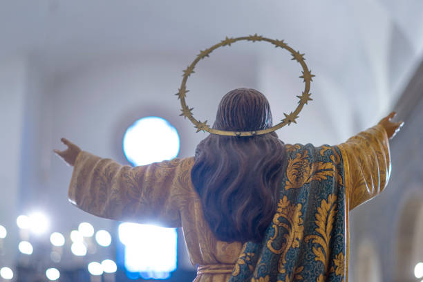 istock jesus christ with his back and open arms towards the light inside the Igreja Matriz de Colares Nossa Senhora da Assunção 1630146776