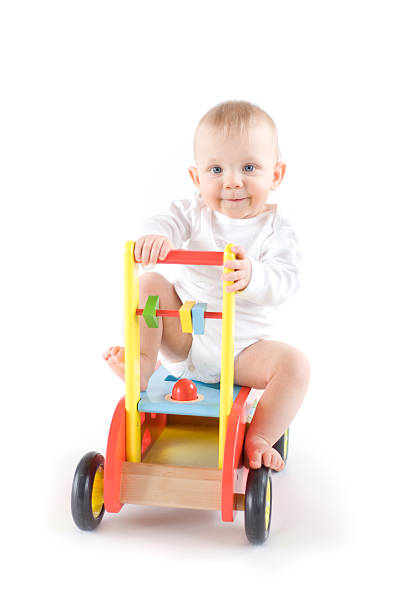istock Baby on toy car 163019599