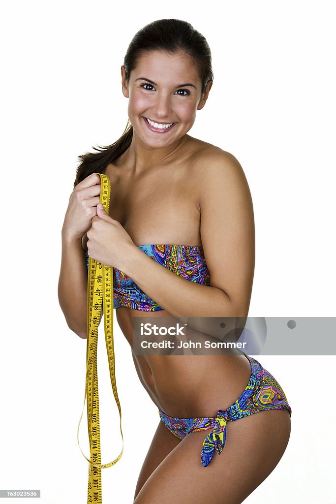 Bikini donna con Metro a nastro - Foto stock royalty-free di 20-24 anni