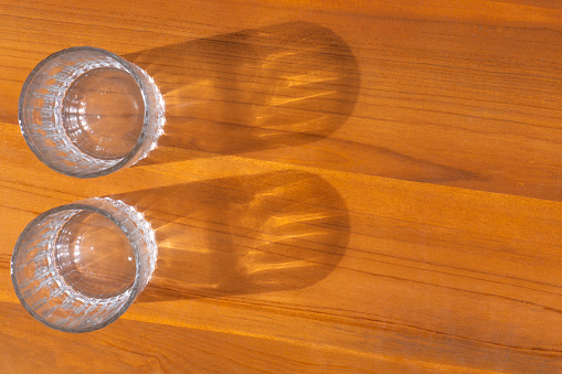 Two beer glasses over wooden  background