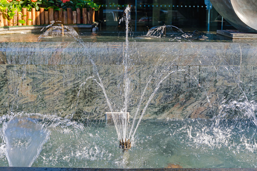 Marble Stone Water Jet Fountain in Front of Office Building in Hong Kong