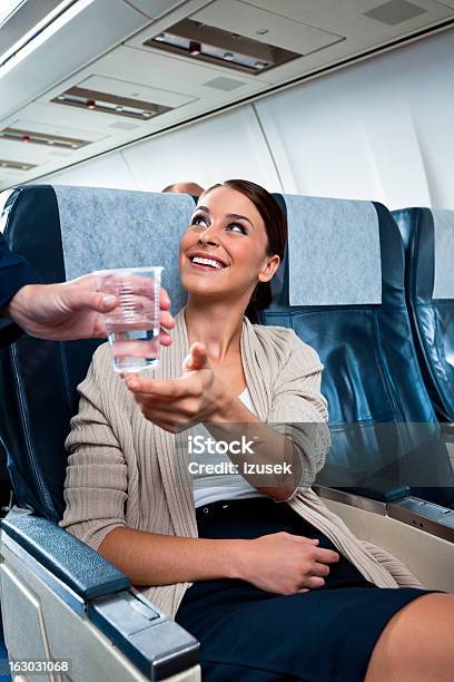 On The Airplane Stock Photo - Download Image Now - Airplane, Drink, Service
