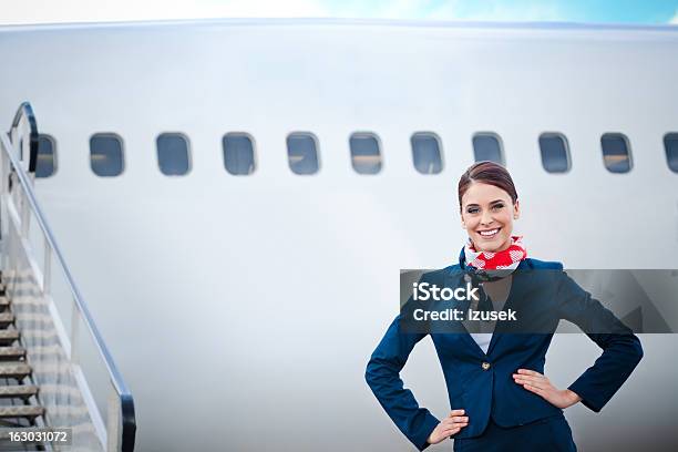Beautiful Air Stewardess Stock Photo - Download Image Now - Air Stewardess, Airplane, Cabin Crew