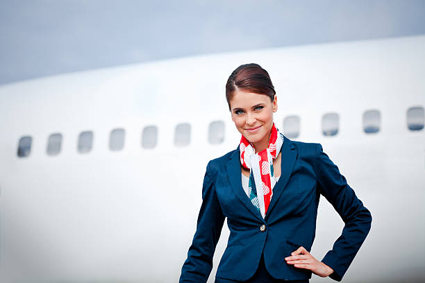 istock Beautiful air stewardess 163031083