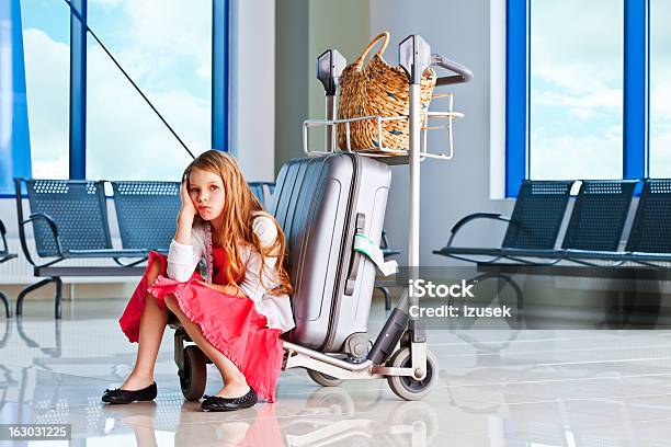 Waiting For The Flight Stock Photo - Download Image Now - Airport, Sadness, Suitcase