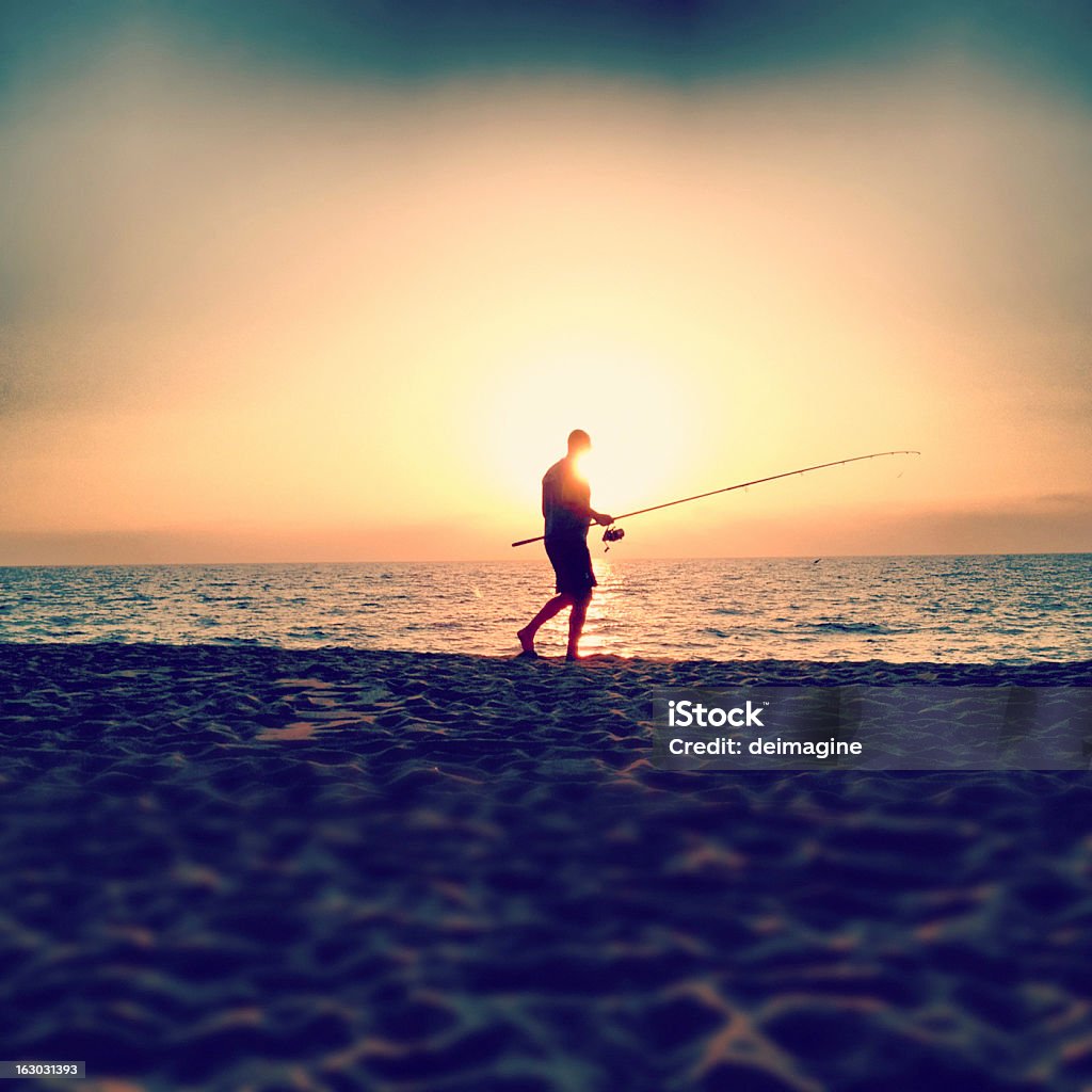 Angeln bei Sonnenuntergang - Lizenzfrei Strand Stock-Foto