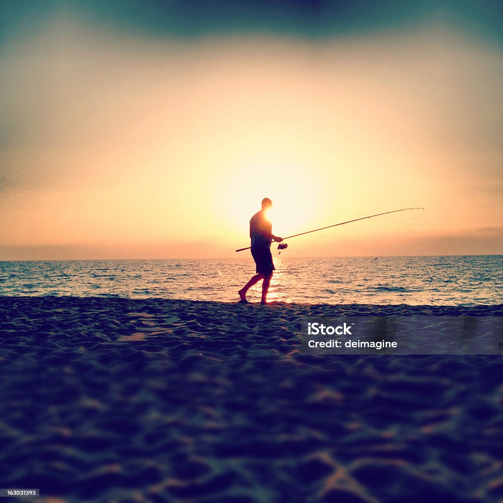 釣りの夕暮れ - 浜辺のロイヤリティフリーストックフォト