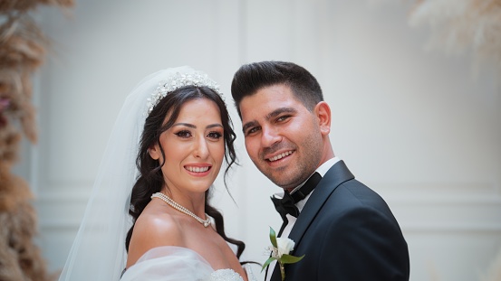 A portrait of a bride and a groom.