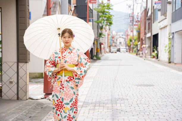 Woman wearing kimono at shrine