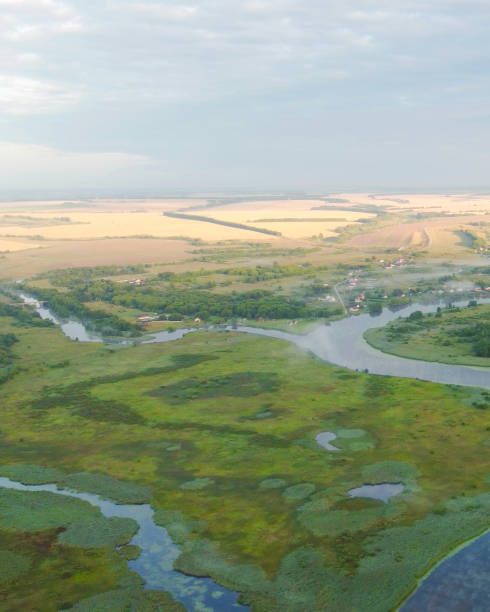 istock Top view misty dawn over the river hills landscape 1630351713