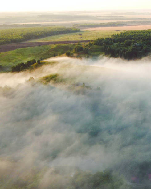 istock Top view misty dawn over the river hills landscape 1630352235