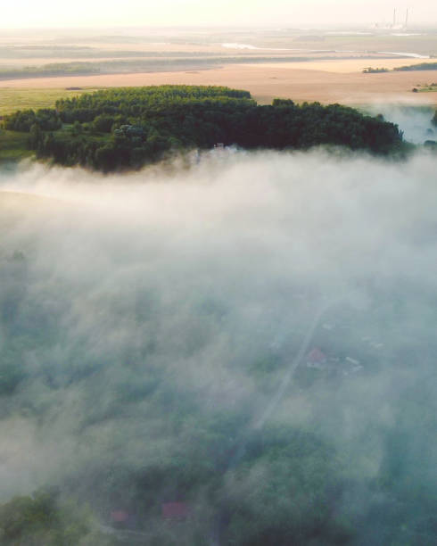 istock Top view misty dawn over the river hills landscape 1630352254