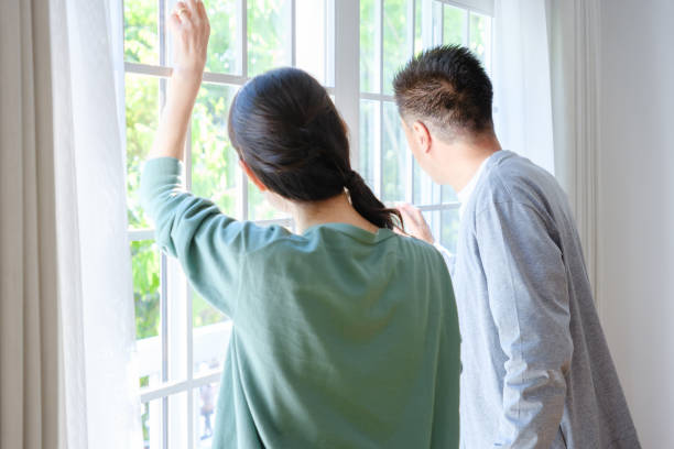 istock senior asian couple relaxing by the window 1630370312