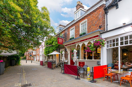 General view of the 18th century Inn and pub The Old Vine, across from the Winchester Cathedral in the town of Winchester, England, United Kingdom
