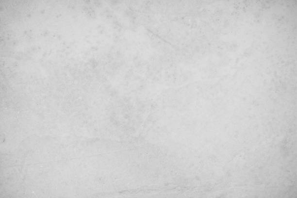 istock Concrete on stone texture for background in black, grey and white colors. Cement and sand wall of tone vintage. Close up retro plain white color concrete wall or grey colour texture cement stone work 1630421261