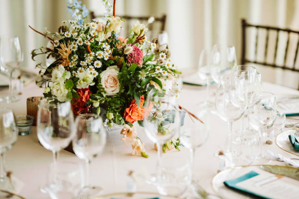 istock Beautiful fresh flower table decoration. Special table set up for a wedding party. 1630430521