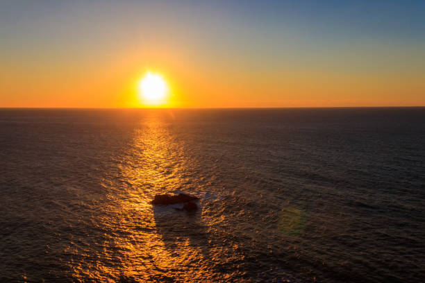 istock View of the Atlantic Ocean from Cabo da Roca at sunset. Cabo da Roca or Cape Roca is westernmost cape of mainland Portugal, continental Europe and the Eurasian land mass 1630469729