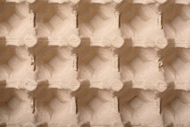 Close-up textured background of corrugated paper for packaging chicken eggs