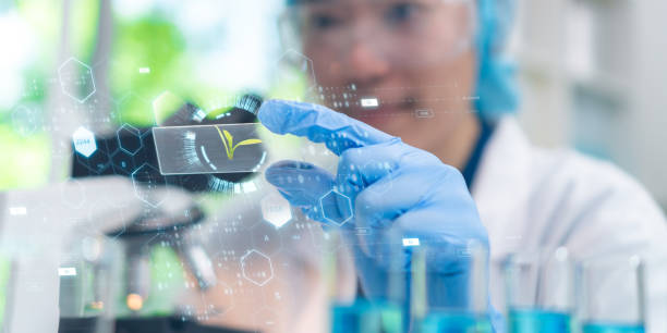 istock Scientific Exploration: Microbiologist Studying Green Leaf in the Laboratory, Biotechnology concept 1630588460