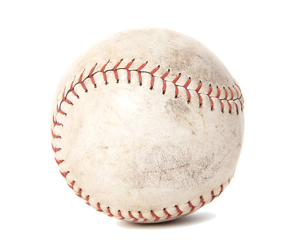 Worn Softball Old, worn softball on a white background baseball isolated on white stock pictures, royalty-free photos & images