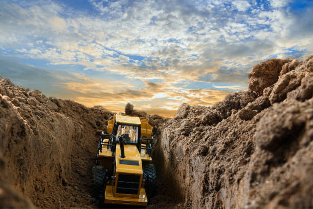 istock Wheel loader are digging the soil in the construction site 1630613140