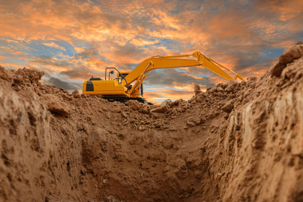 istock Excavators are digging the soil in the construction site 1630613152