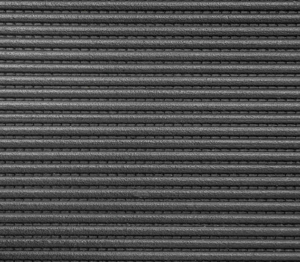 Elastic rubber texture in black color. line strange, close up shot