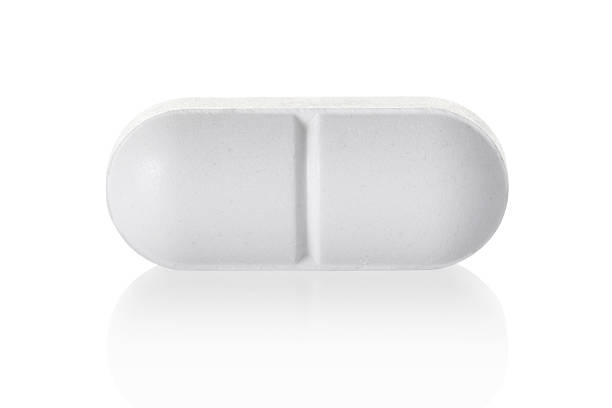 medical pill comprimido - medicinal object fotografías e imágenes de stock