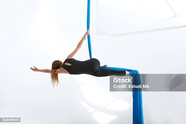 Exercising Acrobatics Stock Photo - Download Image Now - Aerialist, White Background, Acrobat