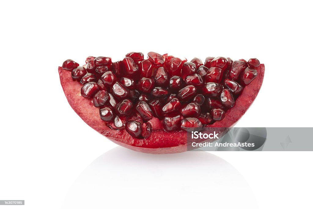 Pomegranate red slice Pomegranate slice isolated on white, clipping path included Antioxidant Stock Photo