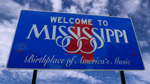 istock Mississippi Travel Sign with clouds 1630733485
