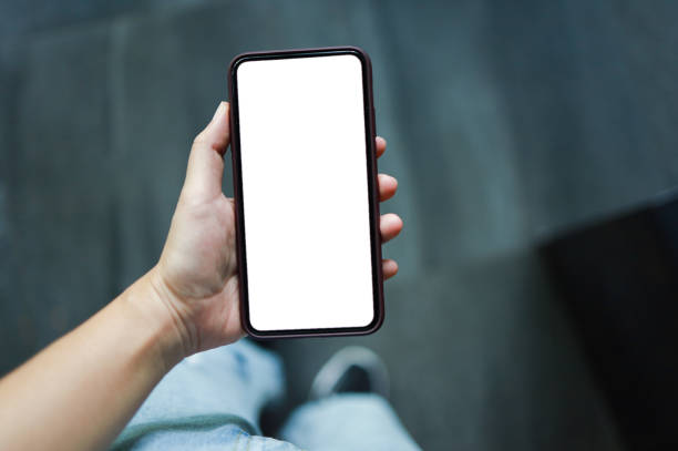 istock Women's hands holding cell telephone blank copy space screen. smart phone with technology concept 1630737230