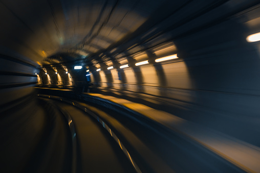 Moving speed Motion of train moving in tunnel abstract background